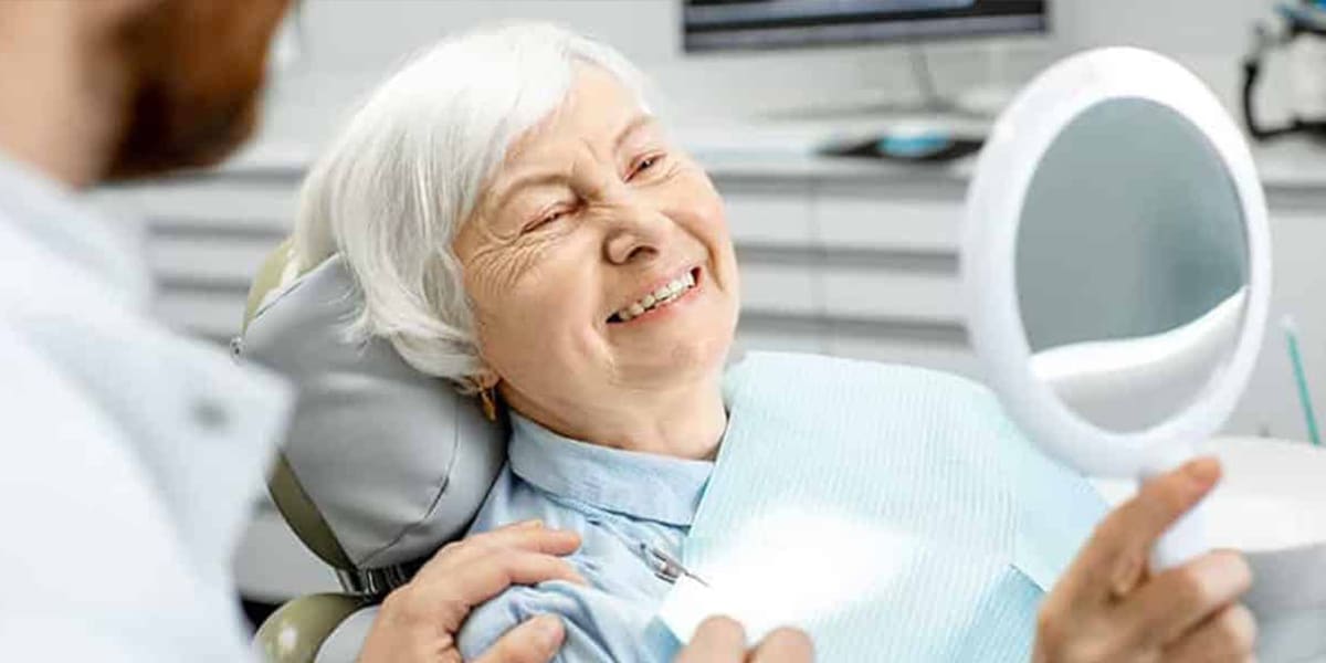 Smiling mature woman admiring her new smile